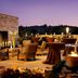 Courtyard by Marriott Los Angeles Sherman Oaks rooftop terrace with lounge seating and candlelit tables at dusk