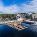 Margaritaville Lake Resort Lake of the Ozarks in Osage Beach with marina docks and lakeside buildings