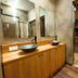 Hana No Shizuku in Ureshino, wood vanity with sinks beside glass doors to a private balcony