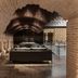 Áurea Toledo by Eurostars Hotel company lounge with arched brick ceiling and modern seating in Toledo