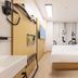 Hi Inn Beijing South Station South Square guest room with double bed, wall-mounted TV and compact sink
