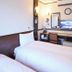 Toyoko Inn Keio sen Hashimoto eki Kita guchi in Sagamihara twin room with desk, mirror and TV