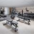 Crowne Plaza San Antonio Airport gym with treadmills, weight bench, dumbbells and exercise bikes