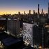 DoubleTree by Hilton Long Island City New York in Queens with Manhattan skyline at dusk