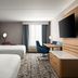 Hilton Garden Inn Richmond South/Southpark room in Colonial Heights with two beds, desk, chair and wall-mounted TV