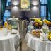 City Park Hotel Chisinau buffet table with fruit, pastries, juice and champagne setup