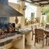 Casa Blanca Hotel in Windhoek outdoor grill and dining patio with wood-fired barbecue