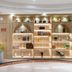 Xiamen Junming Hotel Xiamen lobby display shelves with decor and plants