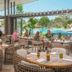 Elements of Byron, Byron Bay: open-air poolside restaurant with guests dining by the resort pool