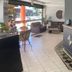 Hotel Arco Do Sol lobby with seating area and front desk in Balneário Camboriú