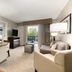 Homewood Suites by Hilton Atlanta - Alpharetta suite with kitchenette, seating area and balcony view