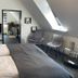 Altstadt-Hotel Gosequell, Goslar: attic hotel room with bed, TV, chairs and skylight