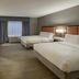 Hampton Inn & Suites St. Louis-Edwardsville guest room in Glen Carbon with two beds, desk and TV