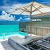 Kagi Maldives Resort & Spa in Kagi with oceanfront deck, infinity pool, loungers and turquoise sea