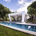 Hotel Nicte in Managua with a modern outdoor pool beside lush tropical landscaping