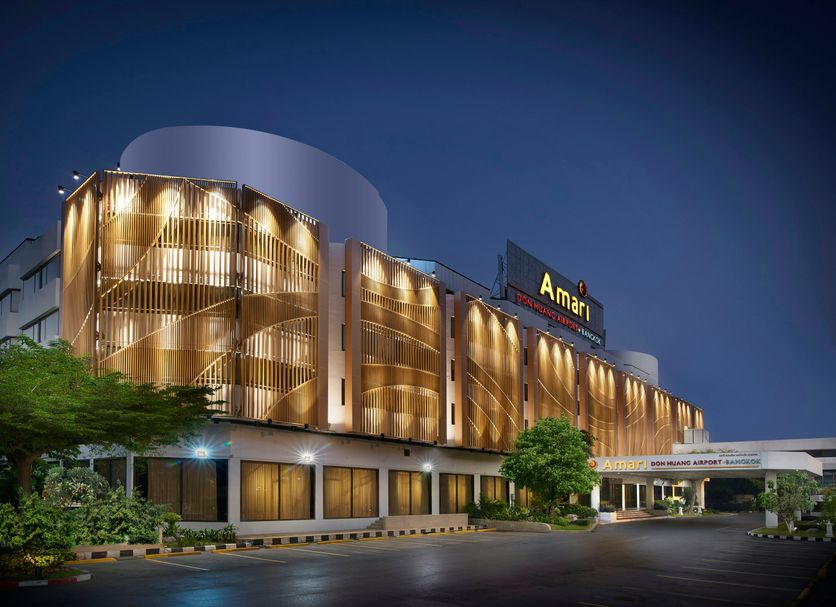 Amari Don Muang Airport Bangkok in Bangkok, lit modern hotel exterior at night