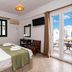 Cyclades Beach Apartments in Platis Gialos room with twin beds, balcony doors and sea view