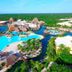 Grand Palladium White Sand Resort & Spa in Akumal with a large lagoon-style pool and tropical grounds