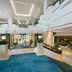 JW Marriott Gold Coast Resort & Spa in Surfers Paradise lobby with blue-carpeted stairs and atrium seating