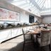 Mercure Aberdeen Ardoe House breakfast room with skylight, buffet counters and dining tables in Aberdeen