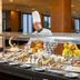 Concorde Green Park Palace in Port El-Kantaoui buffet station with chef, pastries, fruit and desserts