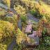 Rendezvous Mendocino in Gualala, aerial view of coastal cottages beside a road and cliffside ocean
