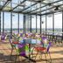 Solo Sokos Hotel Torni Tampere rooftop terrace with colorful chairs and panoramic city views