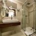 Hotel Blanca Resort & Spa bathroom in Šišava with glass shower, wall-mounted sink and toilet