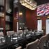 The Warrior Hotel, Autograph Collection meeting room in Sioux City with a set dining table and modern art
