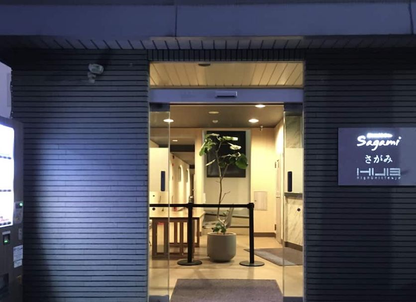Hotel&Co. Sagami entrance in Tokyo with lit doorway and sign at night