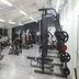 Aparthotel Baden gym with weight machines and benches in Baden