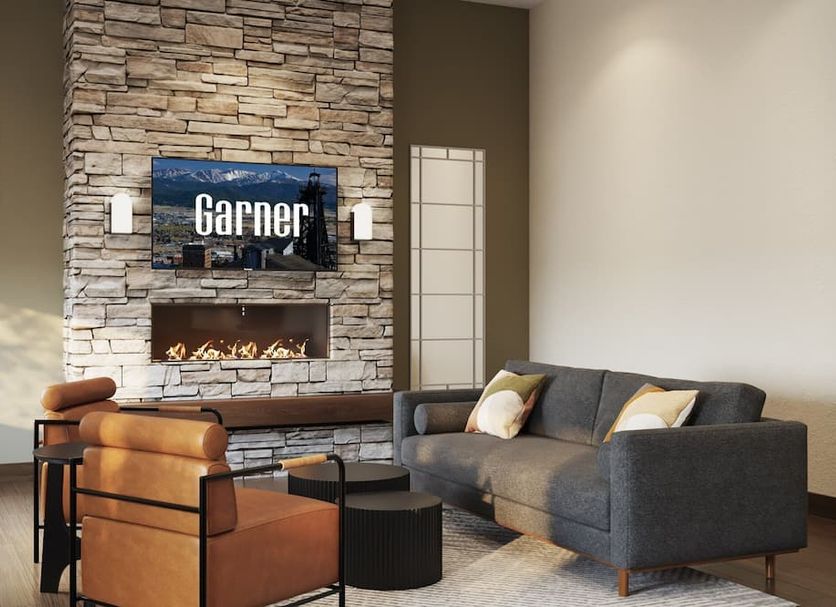 Garner Hotel Butte Southeast by IHG lobby with stone fireplace and seating area in Butte