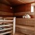 Original Sokos Hotel Rikala in Salo: wooden sauna with benches and rolled towels