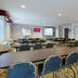 Red Roof Inn Etowah - Athens, TN meeting room with rows of tables and chairs in Etowah