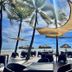 Hotel Tesoro Beach in La Herradura with palm-shaded beach terrace and ocean view