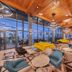 Sandos Papagayo Beach Resort in Playa Blanca lounge with ocean-view windows and colorful seating