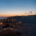 Adalya Art Side in Side: beachfront candlelit dining setup at sunset with sea view