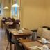 Arador City Hotel in Bad Oeynhausen breakfast room with set tables and pendant lights
