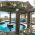 Towers at North Myrtle Beach pool with rock waterfall and ocean view in North Myrtle Beach