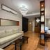 Golden Peak Hotel & Suites powered by Cocotel in Cebu City room with sofa, bed and wood flooring