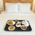 Oyo 8959 New Dk Palace Chandigarh bed with breakfast tray and tea set