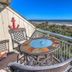 The Breakers Oceanfront 1 Bedroom Villas balcony with table and chairs overlooking Hilton Head Island beach