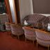Hotel Amar Vilas in Indore lounge with patterned sofas, armchairs and glass-topped tables