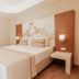 Venosa Beach Resort And Spa Didim room with double bed, wall-mounted TV, and bedside tables