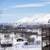 Rauland Høgfjellshotell in Rauland with snowy mountain views and a snow-covered roof