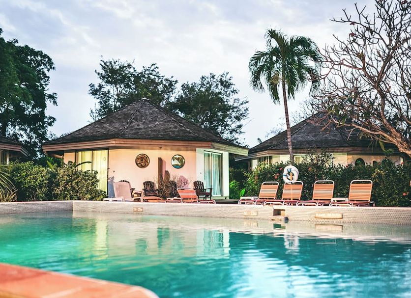 Kariwak Wellness Village, Hotel and Holistic Haven in Crown Point with pool and lounge chairs
