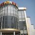 Jia Hao in Beijing, exterior with curved glass facade and gold-trimmed hotel sign