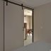 Zandpaviljoen Pier 7 in Vlissingen: bedroom with sliding door opening to a seating area