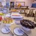 Hotel Itapema Meia Praia breakfast buffet in Itapema with pastries, fruit, and cakes on display