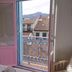 Hotel San Nikolas Sea Views room with open balcony door and mountain views in Hondarribia